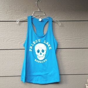 Priest Lake Brewing tank sugar skull turquoise blue and white